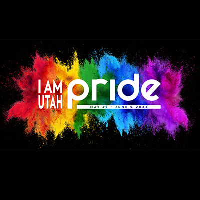 'I Am Utah Pride' overlayed on a rainbow color splash