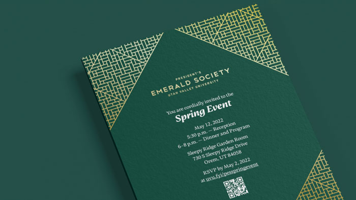 Green invitation with gold details