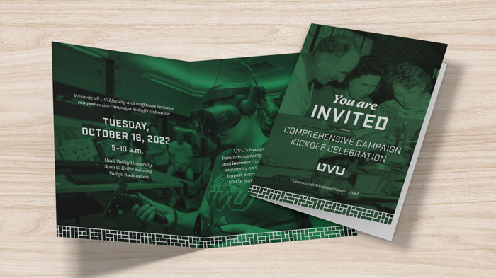 Folded invitation with green overlay on top of images