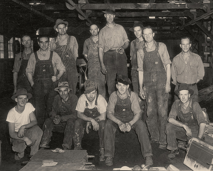 Historic image of students in the foundry