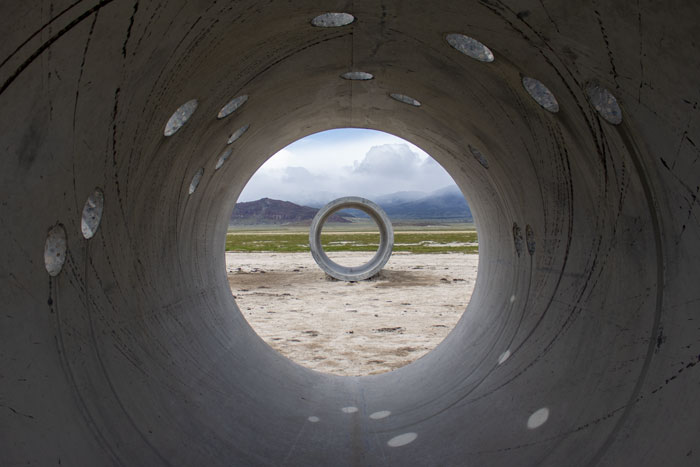 A view of the Sun Tunnels in norhtern Utah framed by a different tunnel