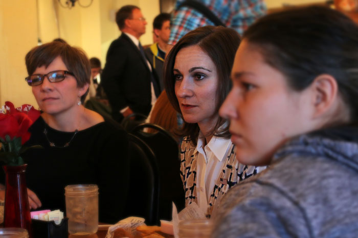 Vice Presidential candidate Miny Finn sitting with two women at the event
